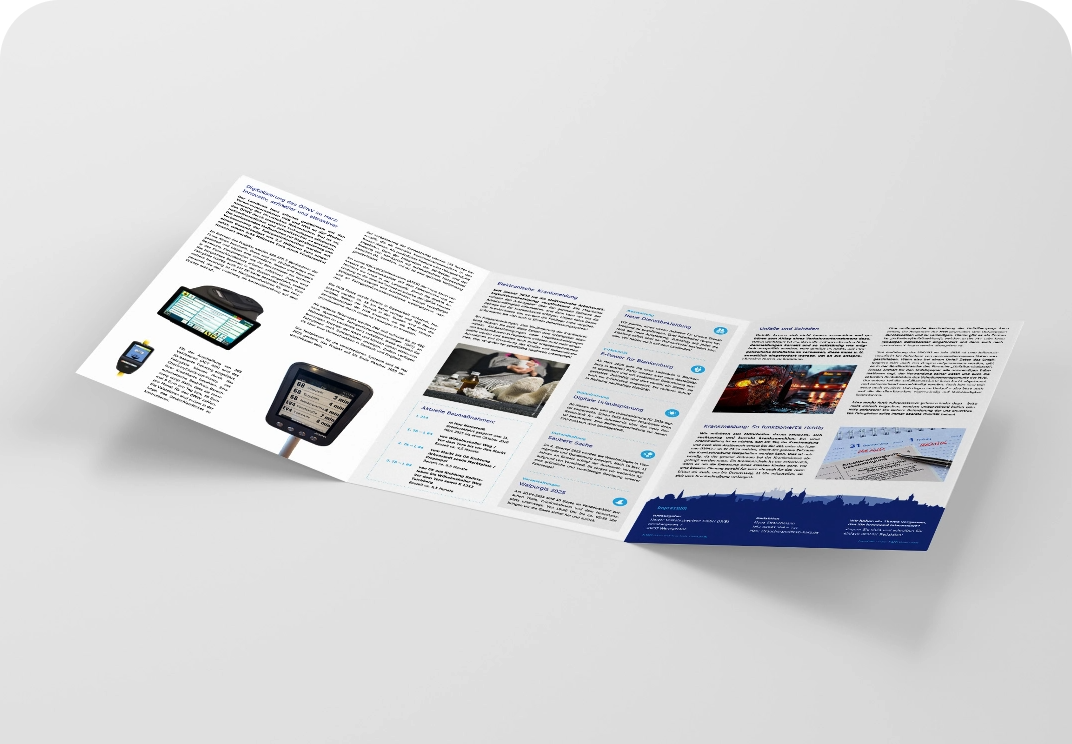 Aufgeschlagene Broschüre mit Produktinformationen und Veranstaltungskalender